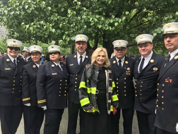 U.S. Rep. Carolyn Maloney with firefighters. Photo courtesy of Office of Congresswoman Carolyn Maloney