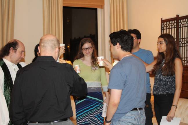 From far left and following the LARP circle: The Eudaimonic Integrated Collective, aka Josh Kronengold; The Quicksilver Buddha; Ianthe Scarlet-Moon-Rising, looking like Sarah Judd; SERPENTINE, who resembles John Isabella; Shaktideva; Edward Strephon Davenport, looking a lot like James Mendez Hodes; and Annas of Malacor, aka Alden Strock, wearing black. Photo: Liz Susman Karp